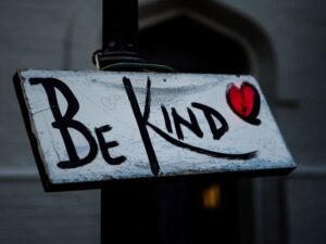 A sign that says "Be Kind"